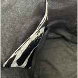 Close-up of pocket with grommet