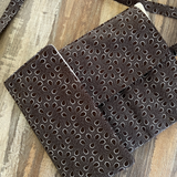 brown knitting needle case partially closed