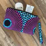 purple african purse in use