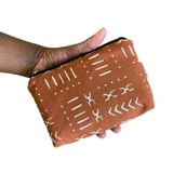 small zip bag for purse in hand