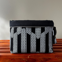 white and black zippered knitting bag 