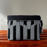 white and black zippered knitting bag 