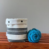 Yarn keeper folded down