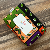 colorful small pouch with business card on top
