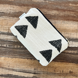 mudcloth pouch on wooden surface