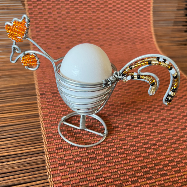 orange beaded wire chicken egg holder with egg